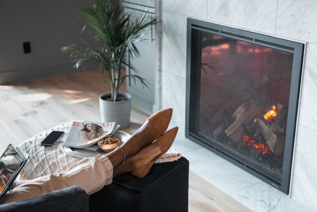 Mom relaxing in front of gas fireplace