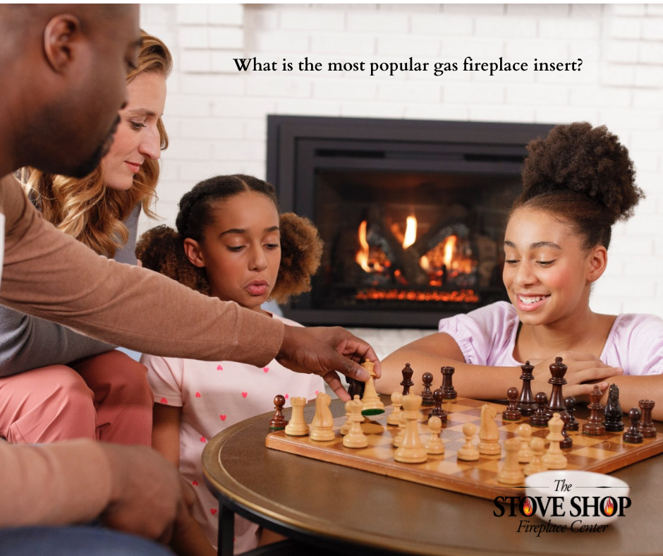 Family playing chess near fireplace