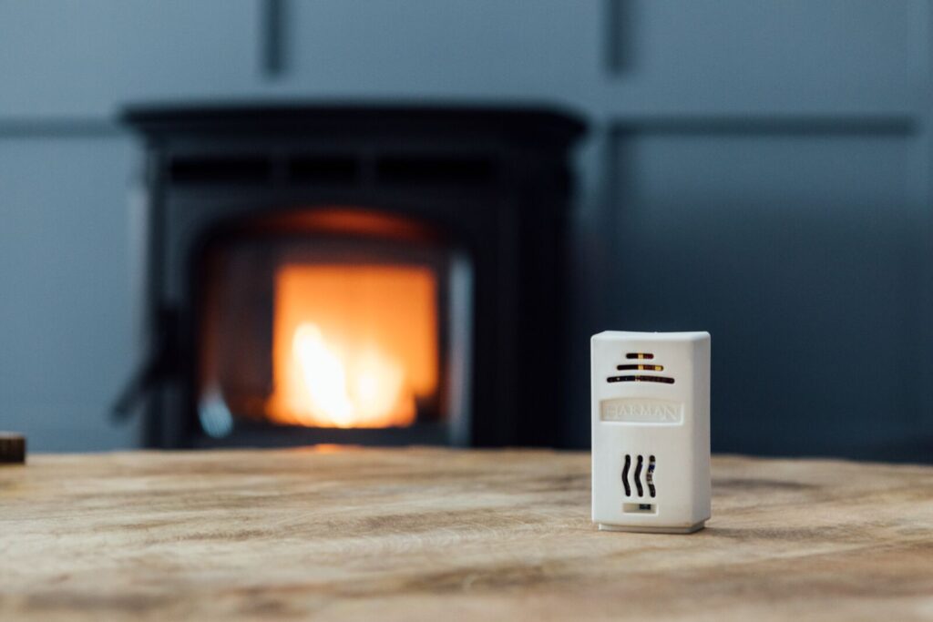 thermostat for harman absolute pellet stove in living room creating heat for a living room